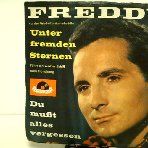 SINGLE / Freddy* – Unter Fremden Sternen / Du Mußt Alles Vergessen