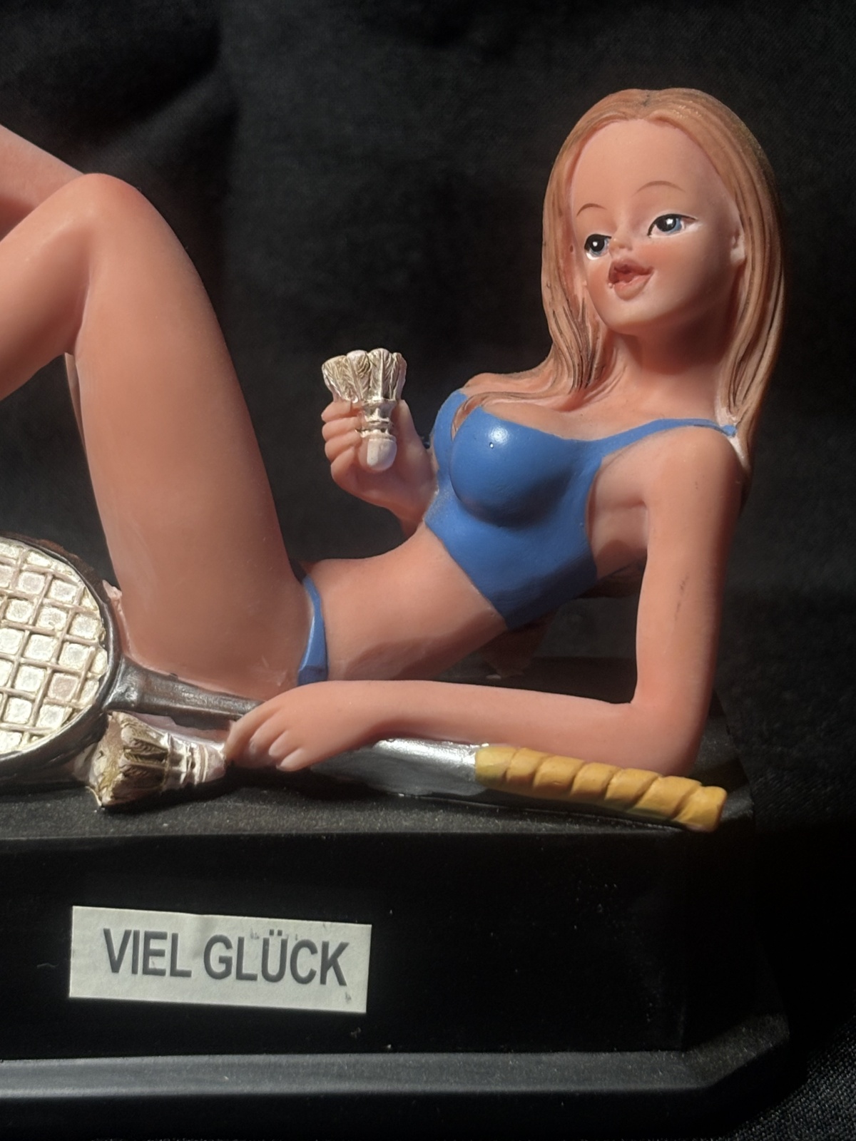 Viel Glück Figur einer Tennisspielerin