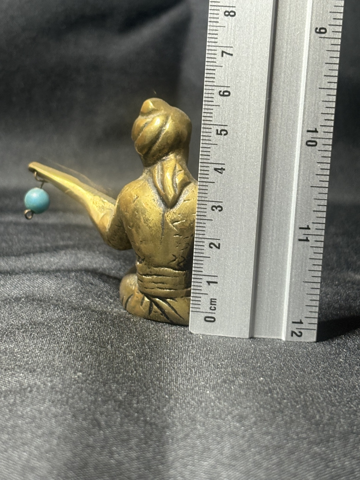 arabische Figur eines sitzenden Musikers aus Bronze