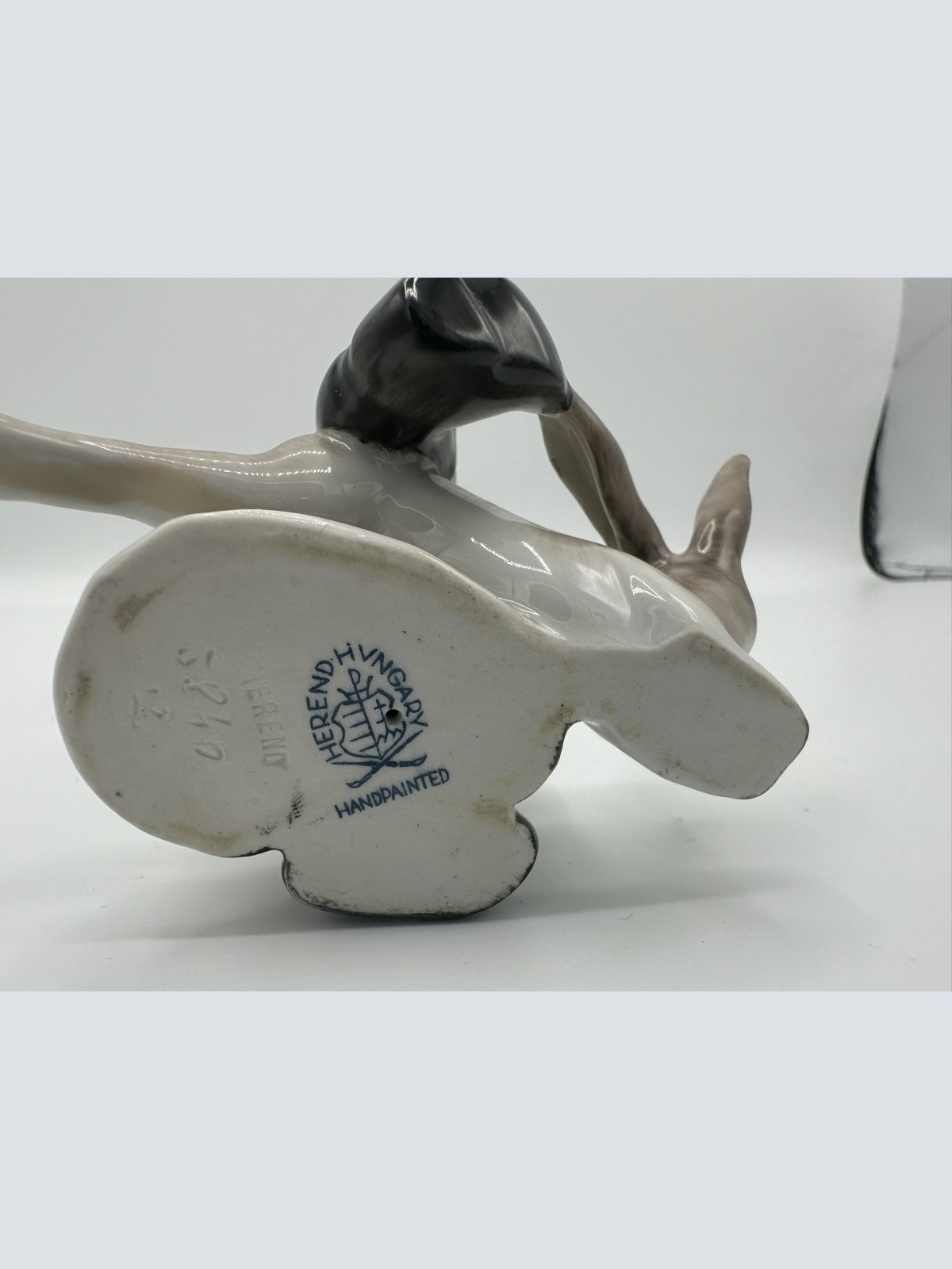 Herend Jägerjunge mit Hasen