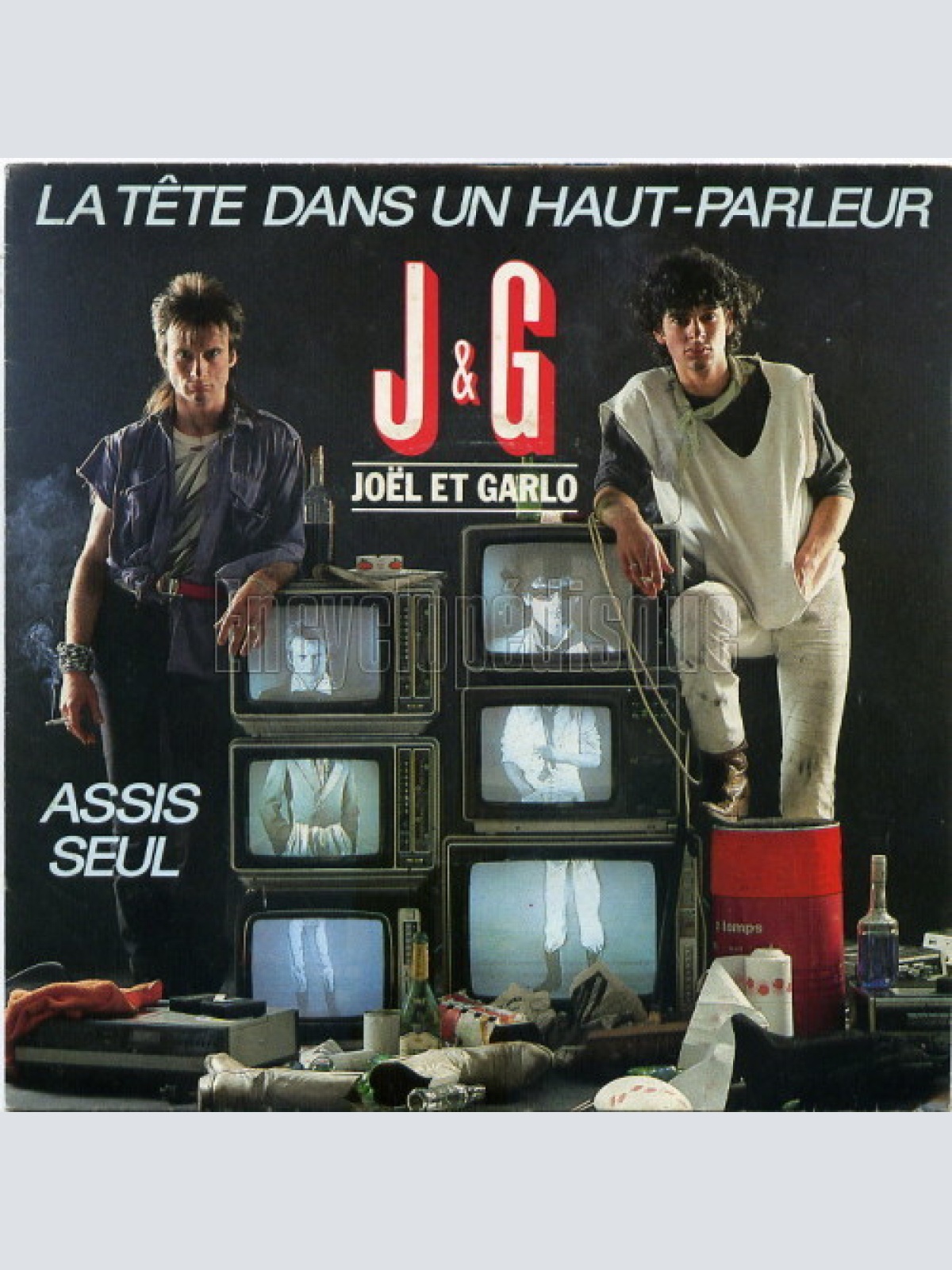 Vinyl / J & G* - La Tête Dans Un Haut-Parleur / Assis Seul