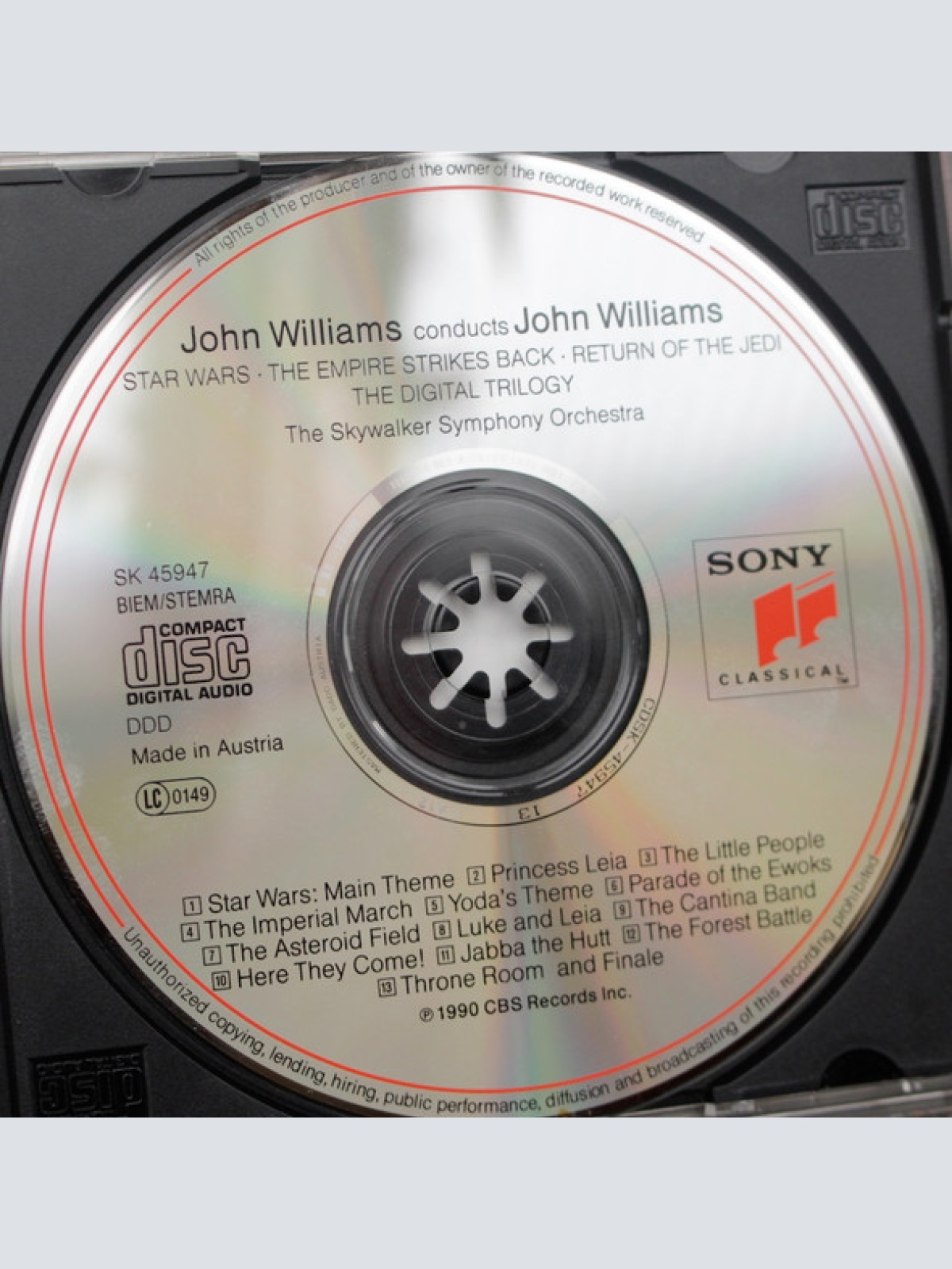 CD / John Williams (4) Conducts  John Williams (4) - The Star Wars Trilogy (Star Wars / The Empire Strikes Back / Return Of The Jedi)