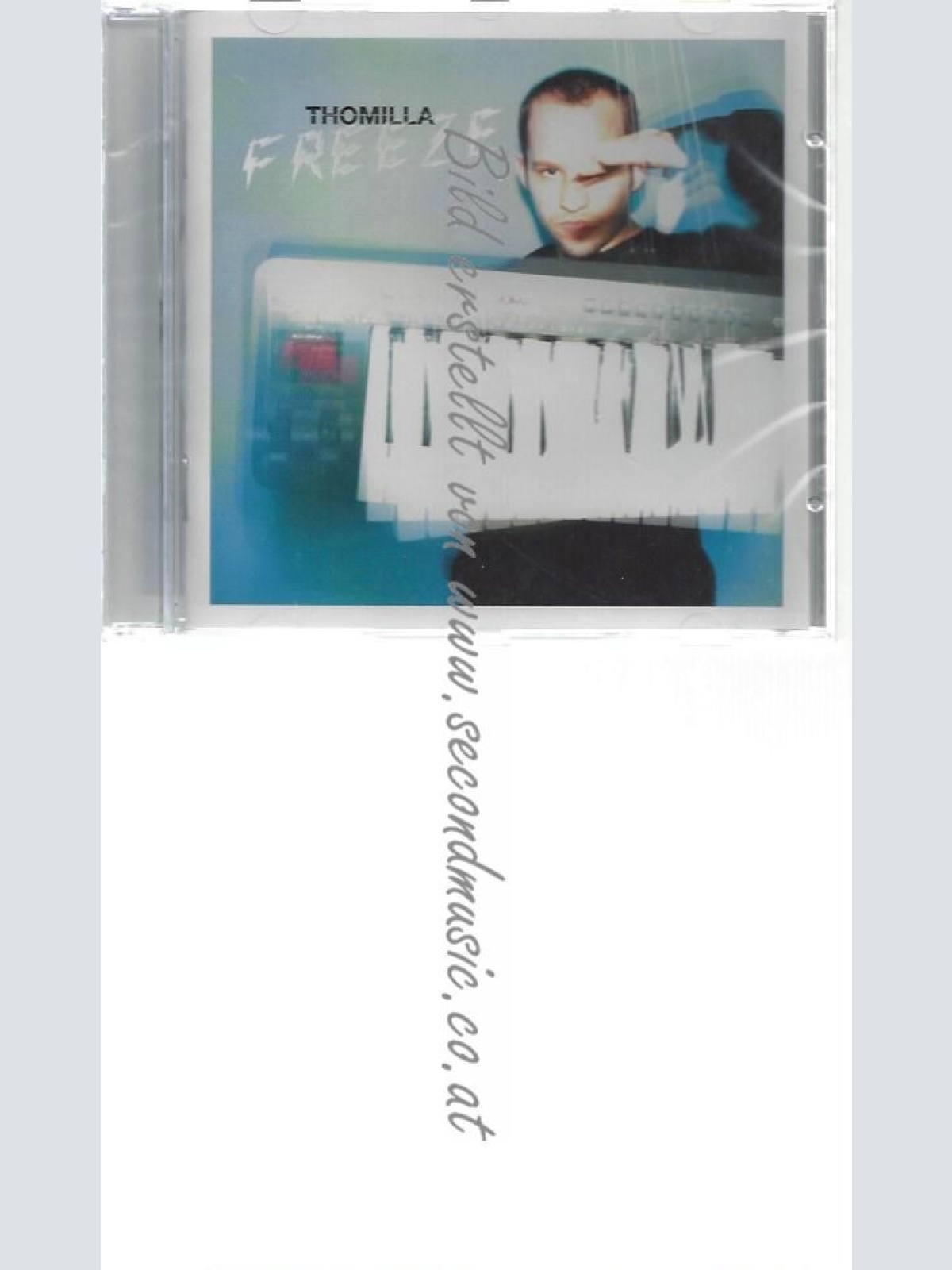 CD--THOMILLA--    FREEZE