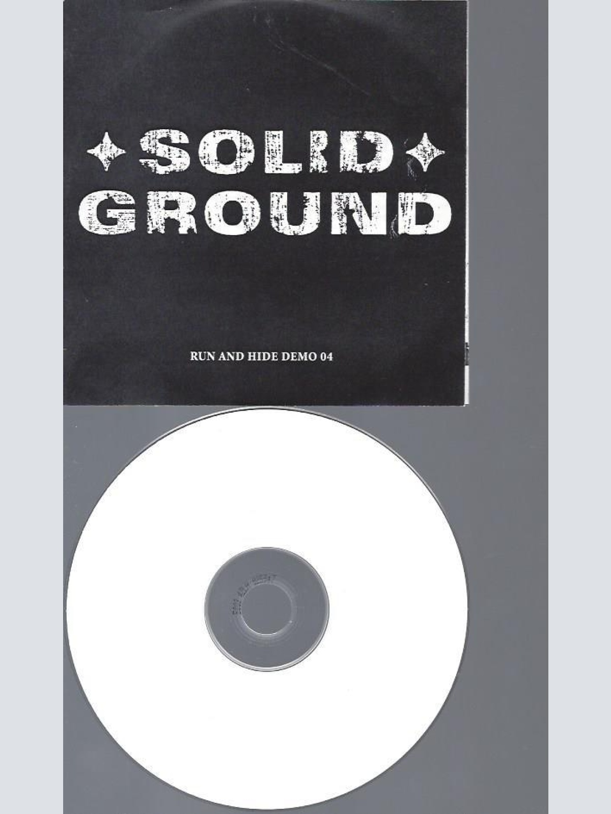 CD--  Solid Ground  – Run And Hide Demo 2004    // PROMO