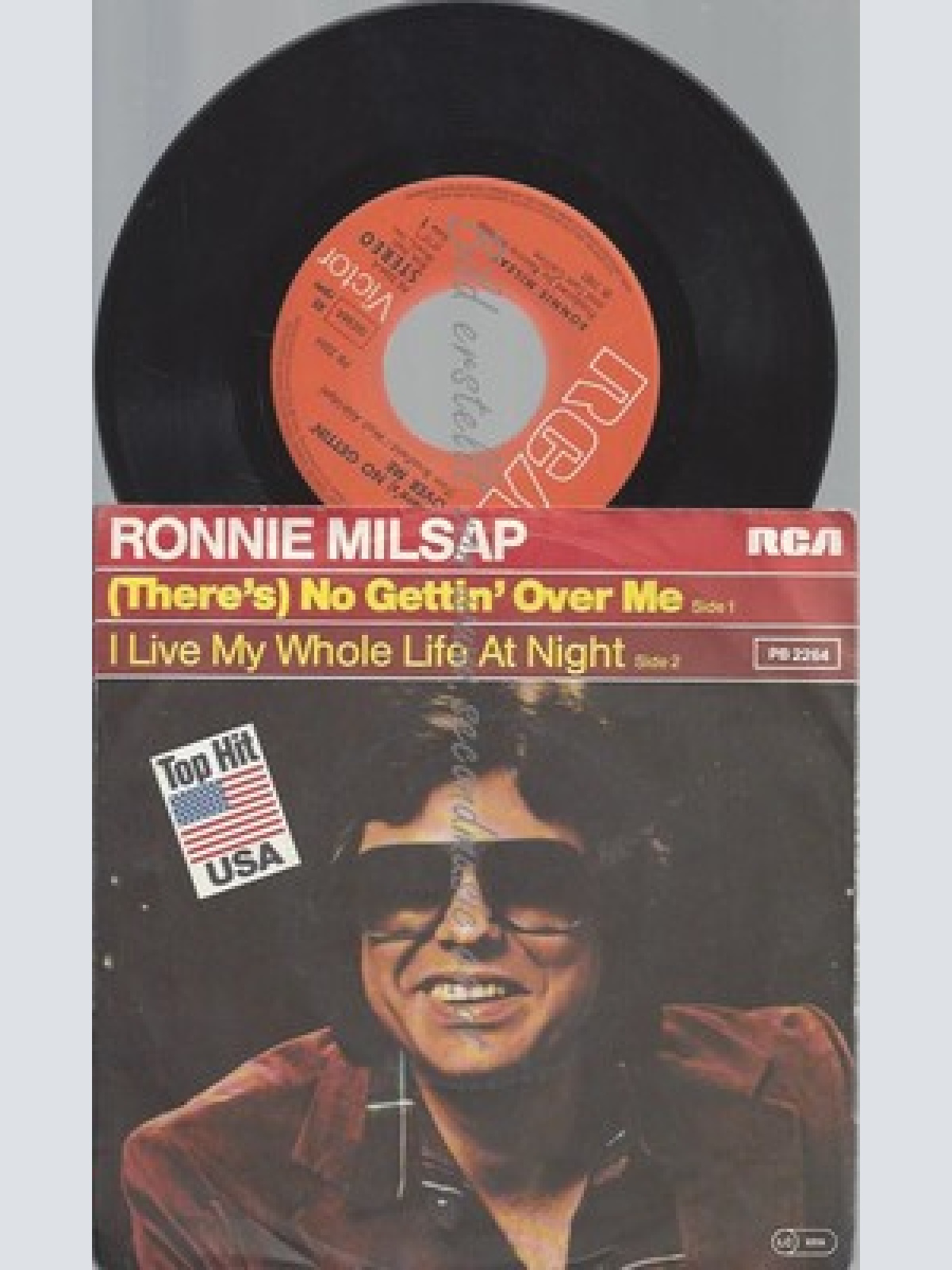7"--RONNIE MILSAP--THERE'S NO GETTIN OVER ME