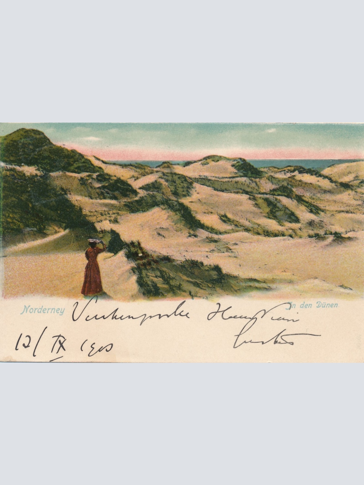 AK aus Norderney in den Dünen mit einer Frau Niedersachsen Ansichtskarte (11369)