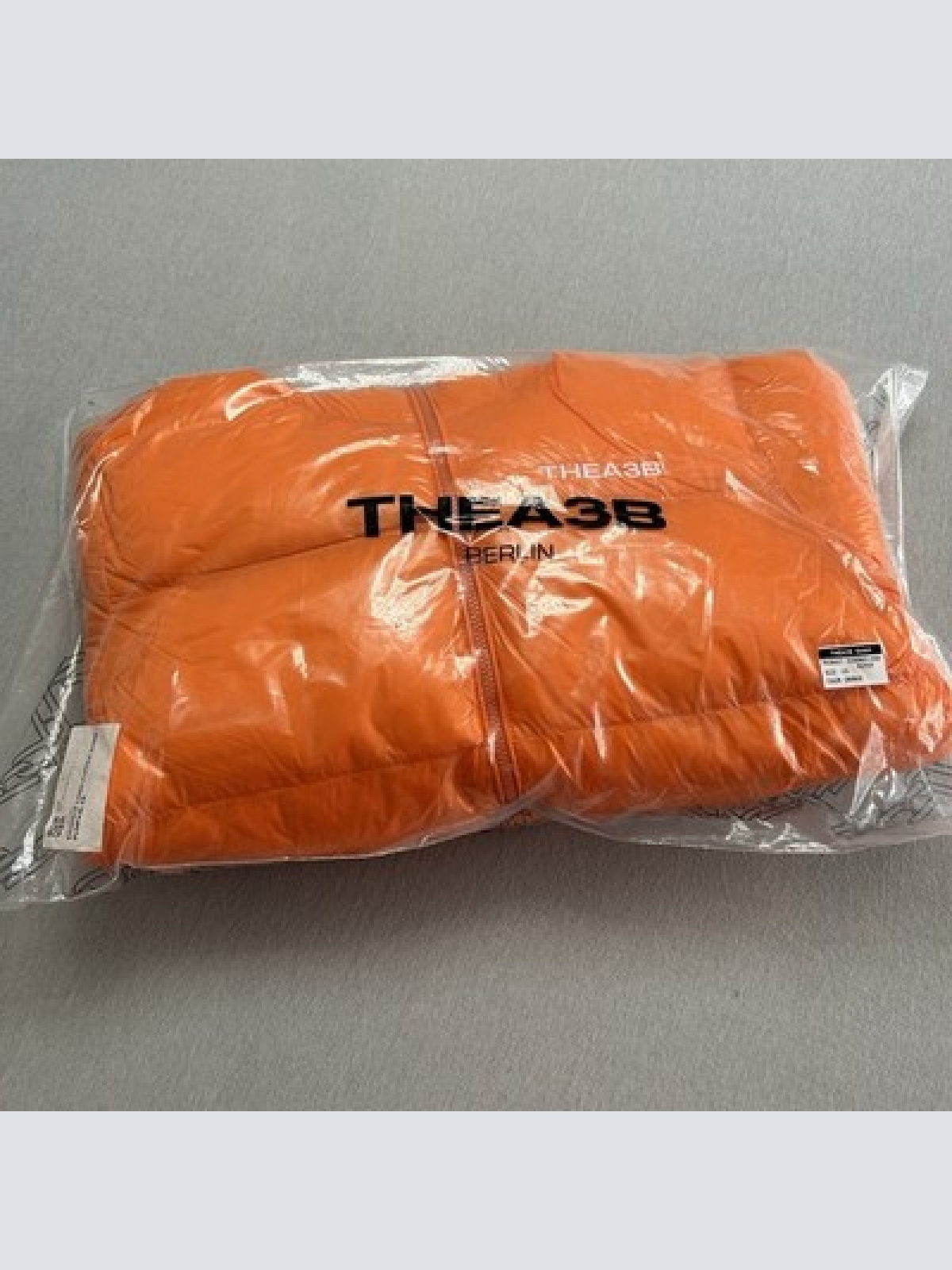 TheA3B Essence Logo Puffer Jacke Orange Größe XS Neu mit Etikett WINTERSALE!